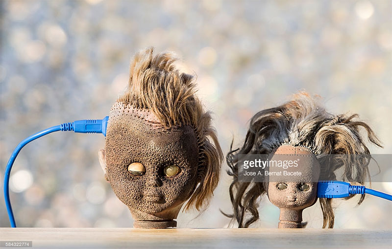 Two doll heads. Photo Credit: Jose A. Bernat Baceta - 584322774 via gettyimages.com