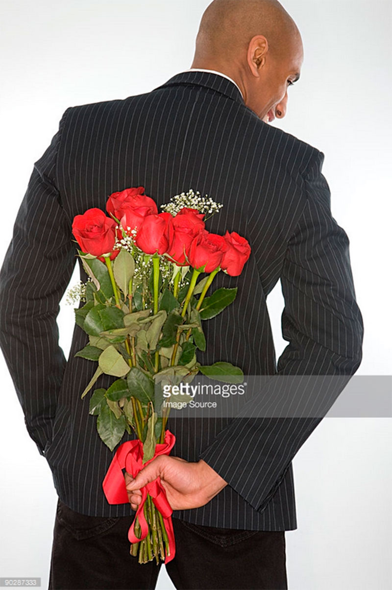 Photof of man with flowers. Imagesoure -90287333. gettyimages.com