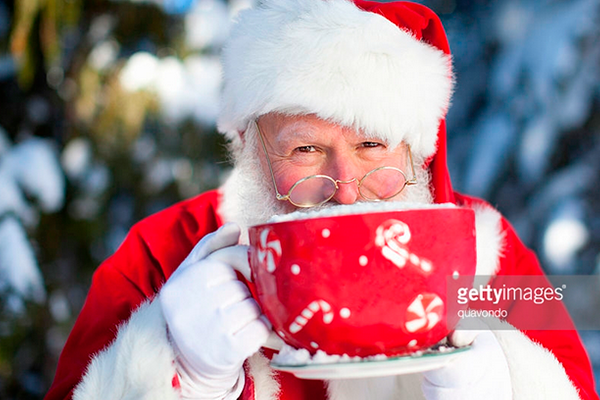 Santa Sipping Cocoa. Photo Credit: Quavondo. Gettyimages. Introvert Guide to Hosting the Family Celebration. Alwaysuttori.com.