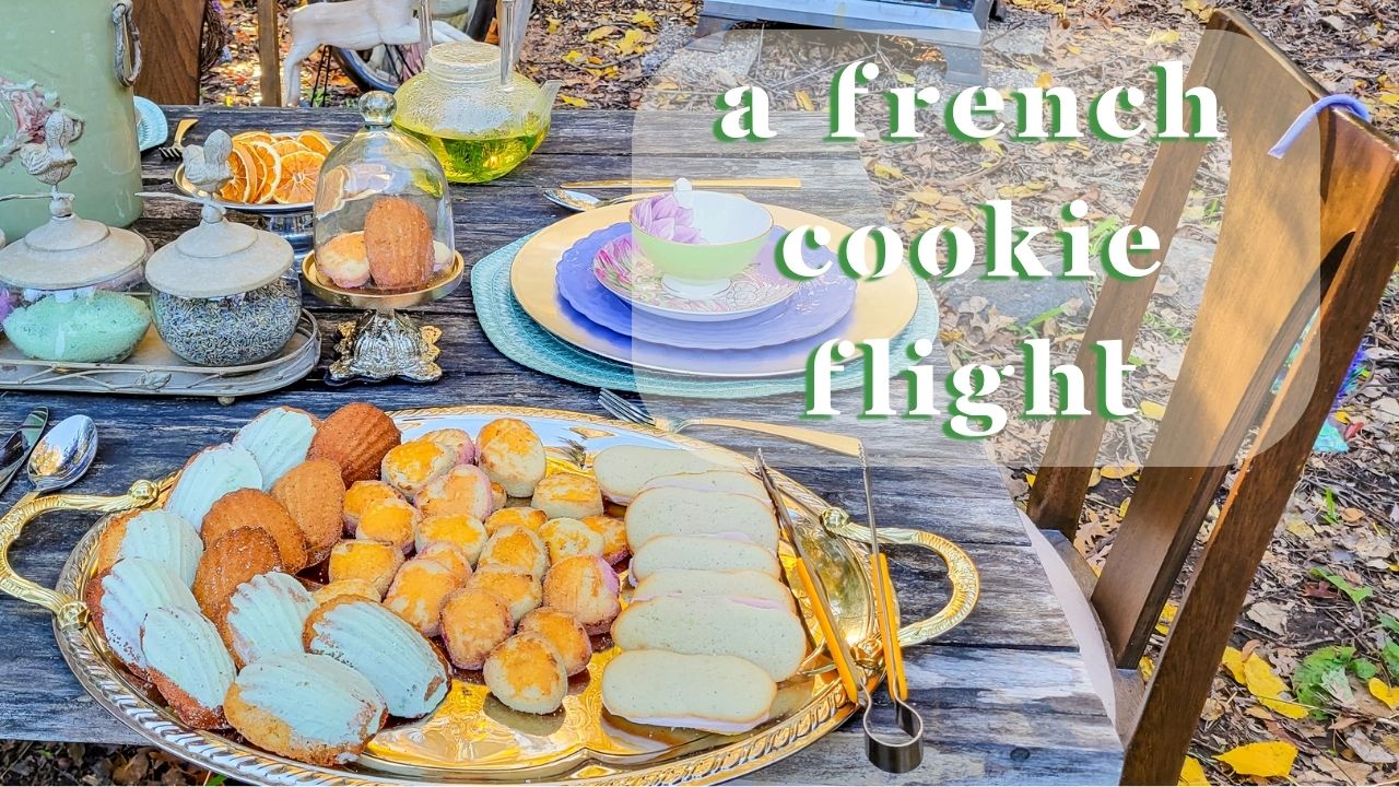A french cookie flight, always uttori presents pistachio madeleine, langues de chat with lavender white chocolate ganache, sable with lavender and sage infused sugar, and lavender and sage tea